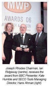 Joseph rhodes chairman, ian ridgway (centre), receives the award from bbc presenter, kate humble and seco tools managing director, hans ahman (right)